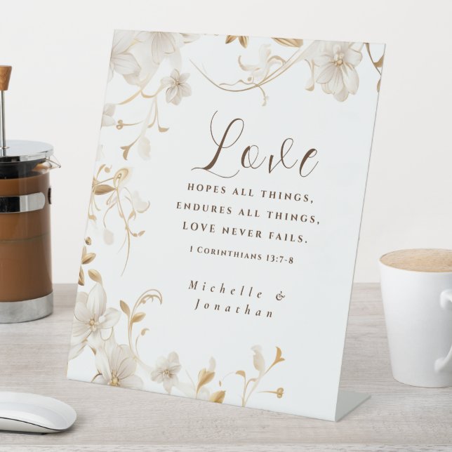 White Tan Floral Love Never Fails Bible Wedding Pedestal Sign (In SItu)