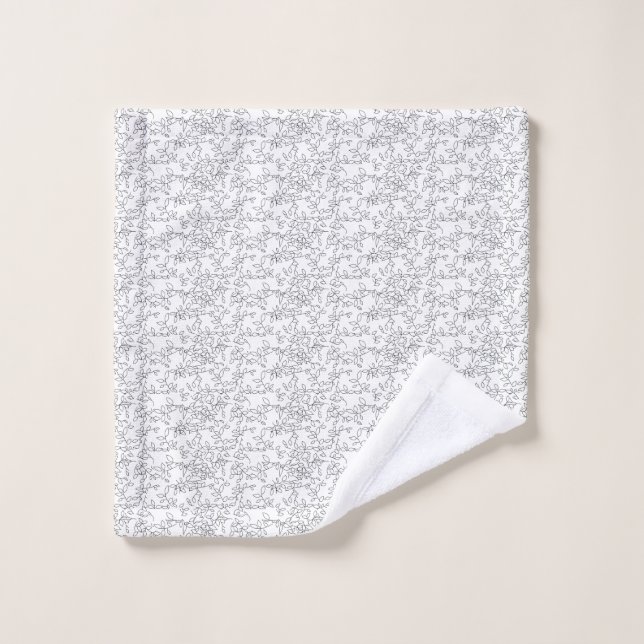 White textured background with subtle, interwoven, bath towel set (Wash Cloth)