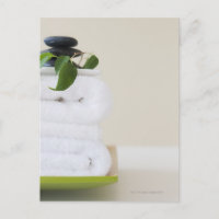 White towels and spa stones