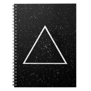 White triangle outline on black star background notebook