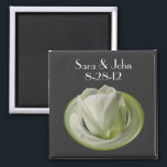 White Tulip Flower Wedding Favour Magnet<br><div class="desc">Delicate white tulip on a black background save the date wedding announcement favour refrigerator magnet. Fill in your information in the template. Make more changes to text and font size, style, and colour by clicking on Customise. If you have any questions or requests, please contact me. This image is available...</div>