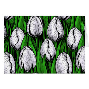 White tulips with green leaves