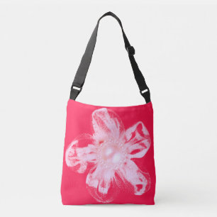 White tulle flower on vivid red crossbody bag