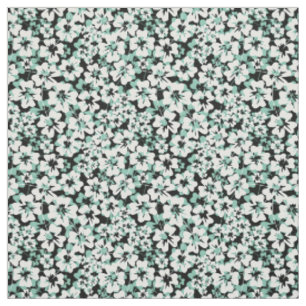White, turquoise flowers on a black. fabric