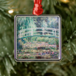 White Water Lilies | Claude Monet Metal Tree Decoration<br><div class="desc">White Water Lilies (1899) | Claude Monet’s White Water Lilies is a serene and captivating painting from his iconic Water Lilies series. This work depicts a tranquil pond adorned with delicate white lily blossoms and green lily pads floating on its reflective surface. Monet's impressionist style shines through in the soft,...</div>