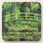White Waterlilies by Claude Monet, Vintage Art Coaster<br><div class="desc">White Waterlilies (1899) by Claude Monet is a vintage impressionist fine art floral nature painting. It is one of many variations of the water lilies and Japanese footbridge paintings that Monet painted in his spring season flower garden in Giverny, France. A pedestrian bridge over a pond in green tones. About...</div>