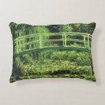 White Waterlilies by Claude Monet, Vintage Art Decorative Cushion<br><div class="desc">White Waterlilies (1899) by Claude Monet is a vintage impressionist fine art floral nature painting. It is one of many variations of the water lilies and Japanese footbridge paintings that Monet painted in his spring season flower garden in Giverny, France. A pedestrian bridge over a pond in green tones. About...</div>