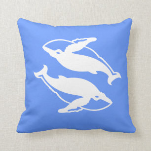 white whales  on  blue pillow