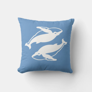 white whales  on  blue pillow