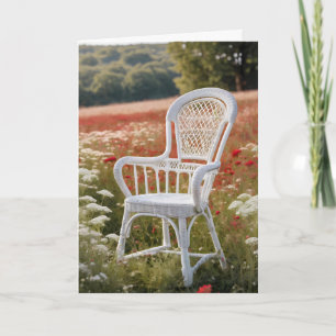 White Wicker Chair In Meadow for Birthday Card