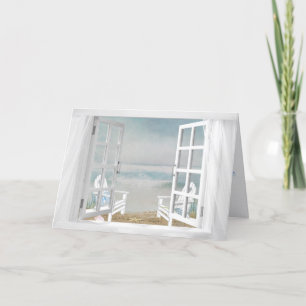 white window with beach card
