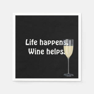 white wine with quote on black napkin