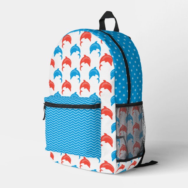 WHITE WITH RED & BLUE ROWS OF DOLPHINS PRINTED BACKPACK (Back Corner Right)