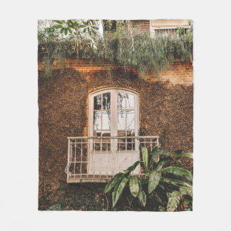 WHITE WOODEN WINDOW FRAME ON BROWN CONCRETE WALL FLEECE BLANKET