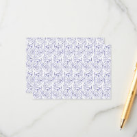 White wrapping paper with a subtle, repeating patt