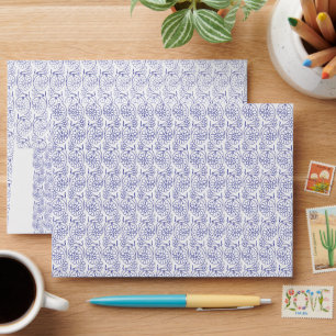 White wrapping paper with a subtle, repeating patt envelope