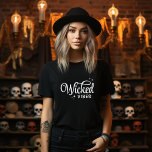 Wicked Vibes Halloween T-Shirt<br><div class="desc">Bring spooky style to your wardrobe with these custom Halloween t-shirts and sweatshirts featuring a trendy retro “Wicked Vibes” text graphic. Personalise with your choice of fonts and colours for a unique look that’s perfect for Halloween parties, trick-or-treating, or casual fall outfits. Available in a variety of sizes and styles...</div>