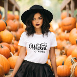 Wicked Vibes Halloween T-Shirt<br><div class="desc">Bring spooky style to your wardrobe with these custom Halloween t-shirts and sweatshirts featuring a trendy retro “Wicked Vibes” text graphic. Personalise with your choice of fonts and colours for a unique look that’s perfect for Halloween parties, trick-or-treating, or casual fall outfits. Available in a variety of sizes and styles...</div>