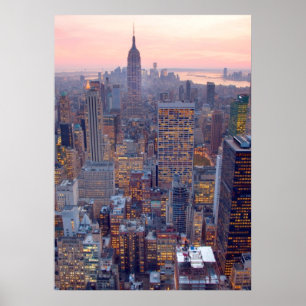 Wide view of Manhattan at sunset Poster
