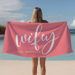 Wifey Pink And White Newlywed Bride Beach Towel<br><div class="desc">Embrace your newlywed status with this stylish "Wifey" beach towel in pink and white, perfect for honeymoons, beach days, or poolside relaxation. Designed for brides and newlyweds, this towel can be personalised with a last name, making it a thoughtful gift or personal accessory. Whether lounging by the beach or pool,...</div>