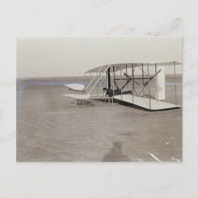Wilbur Wright in Prone Position in Damaged Machine Postcard (Front)