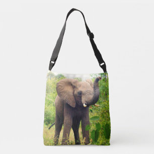 Wild elephant and tropical plants crossbody bag