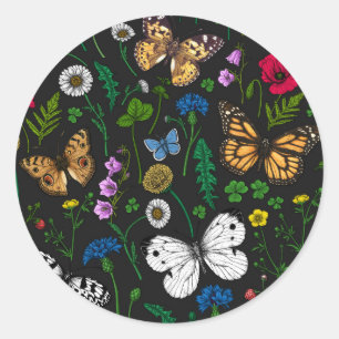 Wild flowers and butterflies on black classic round sticker
