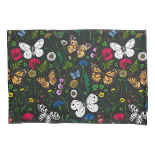 Wild flowers and butterflies on black pillowcase