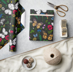 Wild flowers and butterflies on black wrapping paper