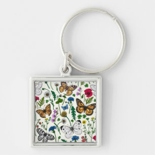 Wild flowers and butterflies on white key ring