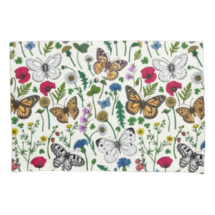 Wild flowers and butterflies on white pillowcase