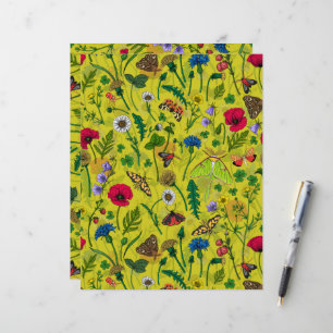 Wild flowers and moths on green