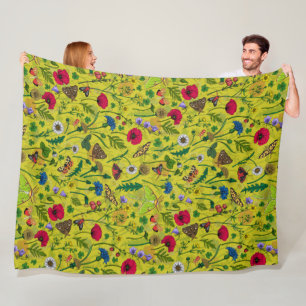 Wild flowers and moths on green fleece blanket