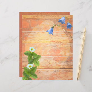 Wild flowers on a worn board background