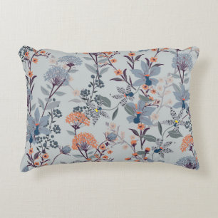 Wild flowers on blue, botanical pattern. decorative cushion