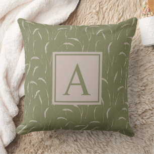 Wild grasses and custom monogram on sage green cushion