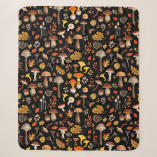Wild mushrooms on black sherpa blanket
