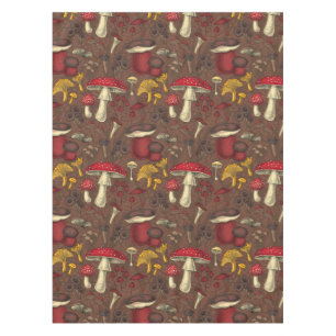 Wild mushrooms on brown tablecloth