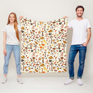 Wild mushrooms on off white fleece blanket