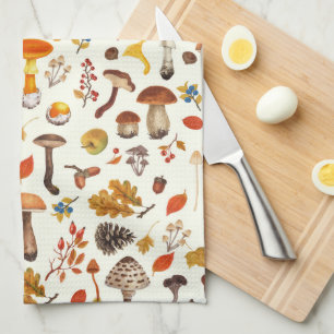 Wild mushrooms on off white tea towel