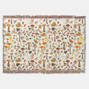 Wild mushrooms on off white throw blanket