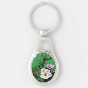 wild pink rose flowers in green. key ring