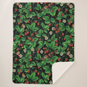 Wild strawberries on black sherpa blanket