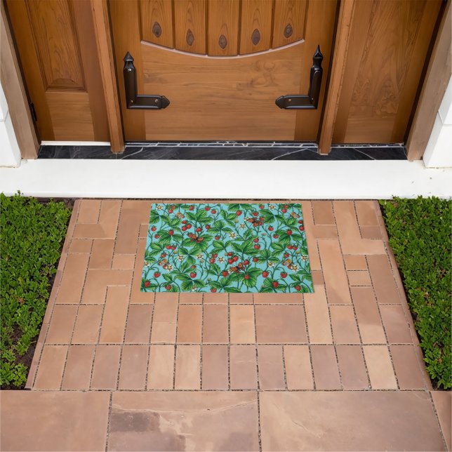 Wild strawberries on pool blue doormat (Outdoor)