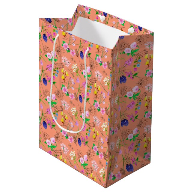Wild watercolor flowers on orange medium gift bag (Front Angled)