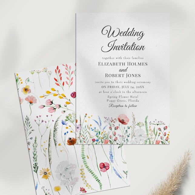 Wildflower Border Wedding Invitation (Boho Colorful Wildflower Meadow Wedding Invitation on a white table.)