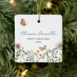 Wildflower Butterfly Baby Girl 1st Christmas  Ceramic Ornament<br><div class="desc">Celebrate your little girl's first Christmas with this exquisite watercolor wildflower and butterfly ornament, a perfect blend of elegance and whimsy. Crafted with meticulous attention to detail, this enchanting piece captures the delicate beauty of nature, making it a cherished keepsake for years to come. Adorned with vibrant hues and intricate...</div>