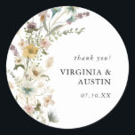 Wildflower Wedding Classic Round Sticker<br><div class="desc">Wildflower Wedding Classic Round Sticker. This elegant whimsical wildflower wedding sticker features beautiful hand-painted watercolor blush pink,  dusty blue,  and sage green pressed flowers with black text on a white background. Find matching items in the Wildflower Wedding Invitations | Pressed Flowers Collection.</div>