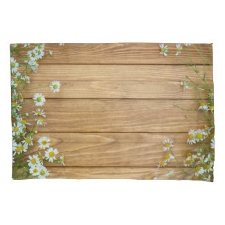 Wildflowers, herbs: wooden background. pillowcase