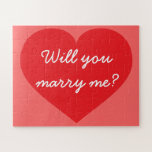 Will You Marry Me? red heart Jigsaw Puzzle<br><div class="desc">This jigsaw puzzle features a shapely red heart overlaid by the template text,  "Will you marry me?" in a white cursive font. Personalise with your girlfriend or boyfriend's name.  Customise font style,  size,  and colour,  as well as the background colour.</div>